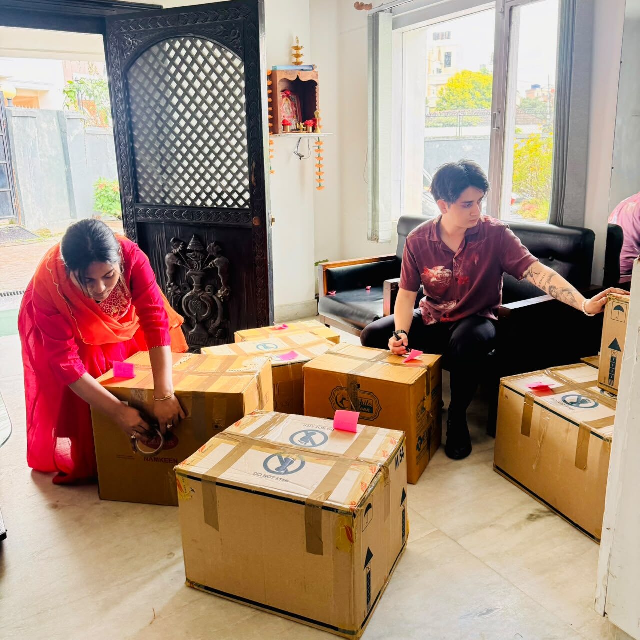 Volunteers packing humanitarian relief boxes