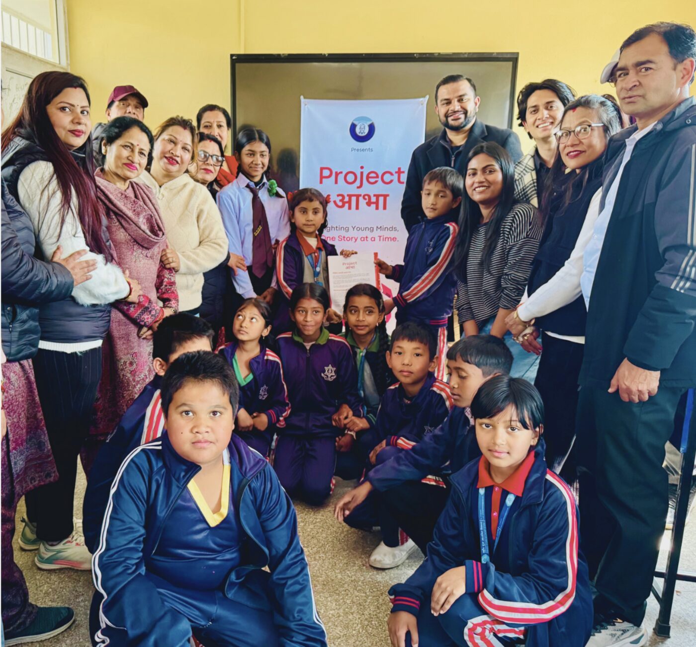 Teachers, volunteers and students gathered at a Kathmandu school