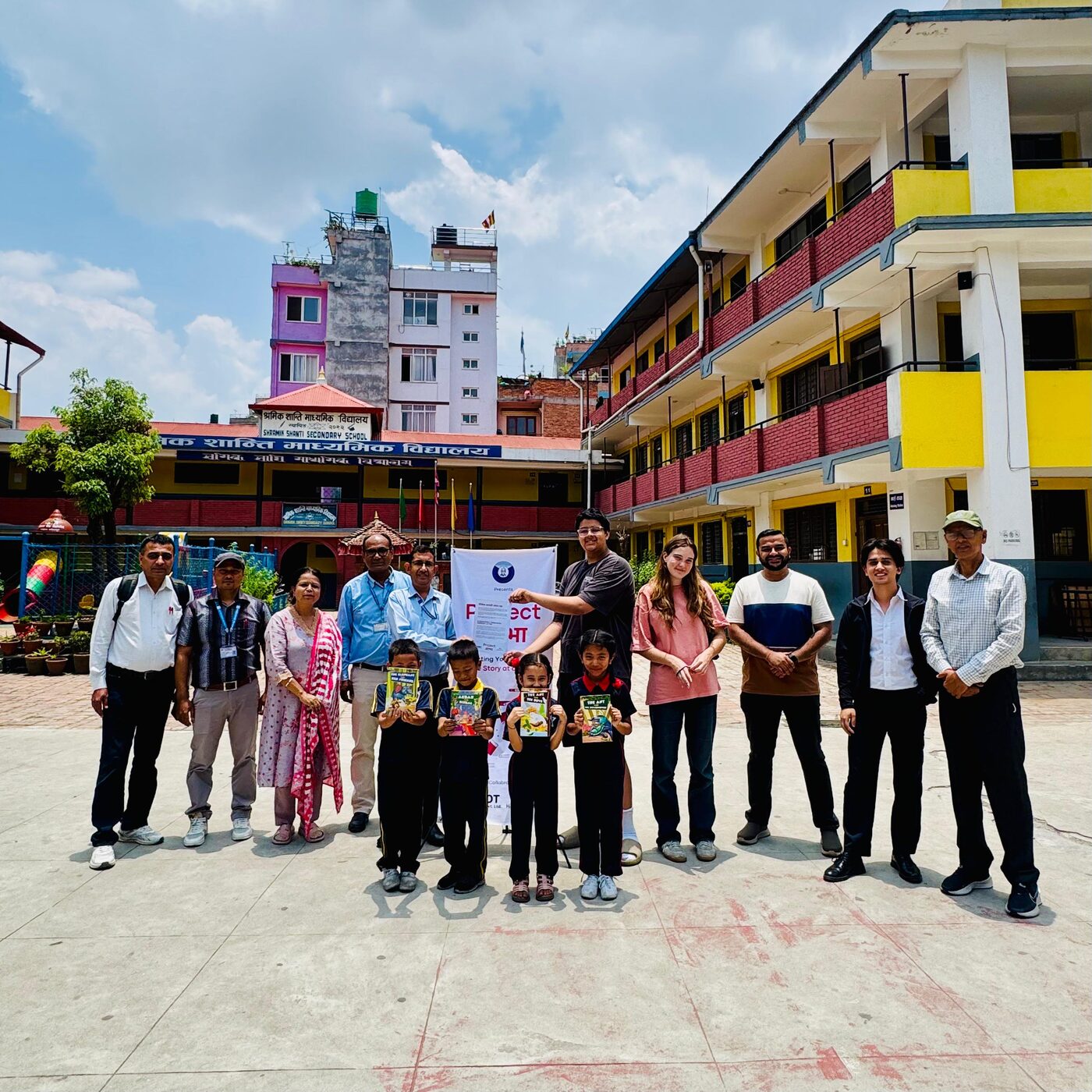 Team and students outside Shramik Shanti Secondary School, Lalitpur