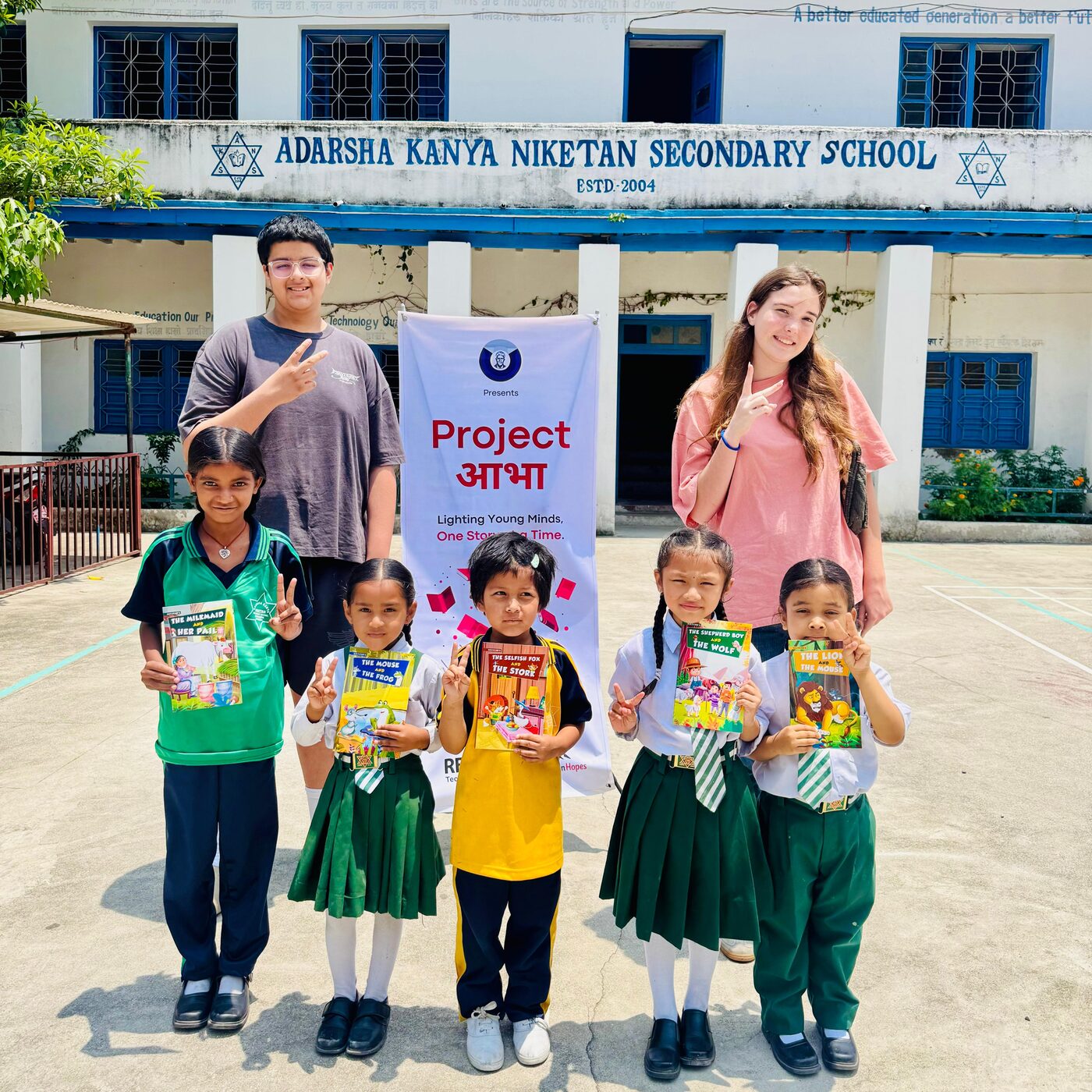Students with storybooks at Adarsha Kanya Niketan Secondary School, Lalitpur