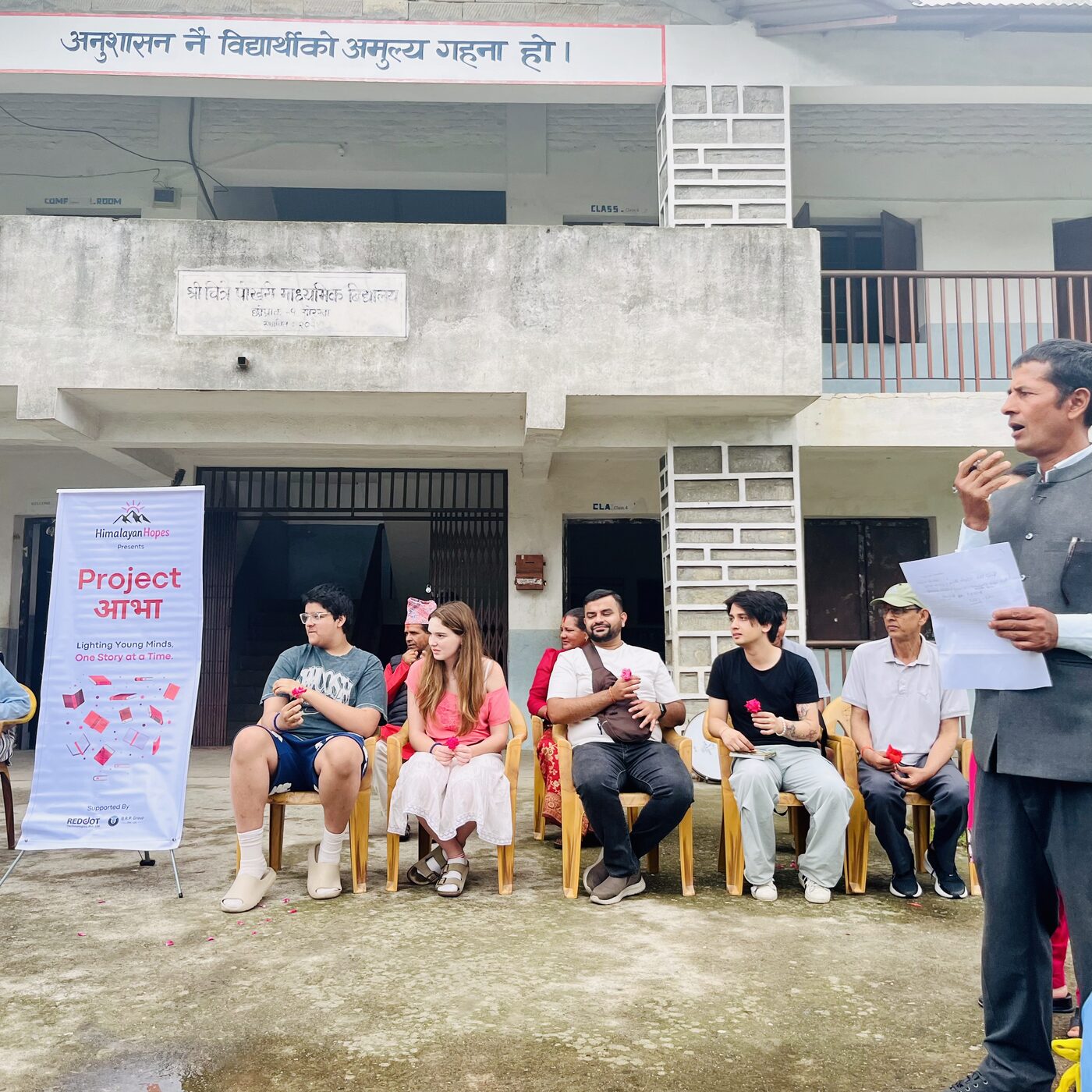 Project Aabha book-donation event with students and teachers