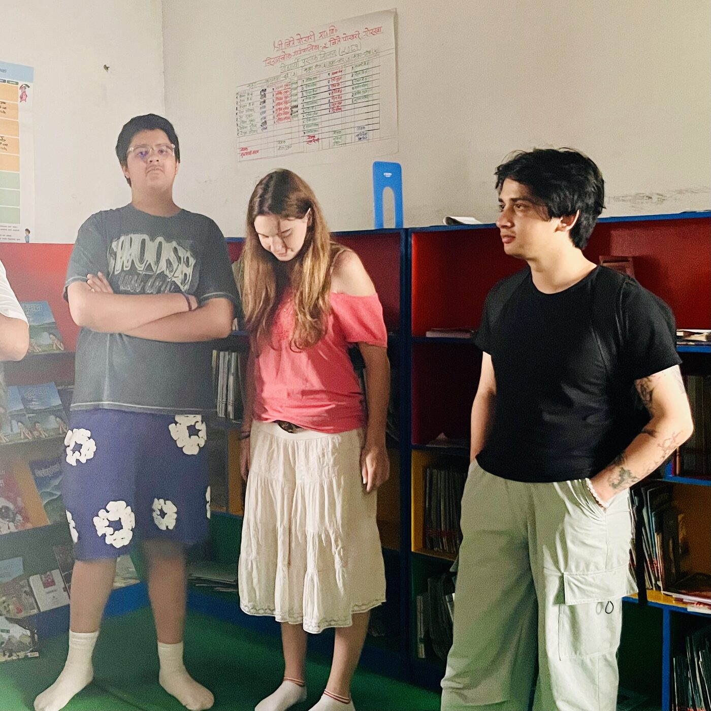 Himalayan Hopes team touring a colourful school library